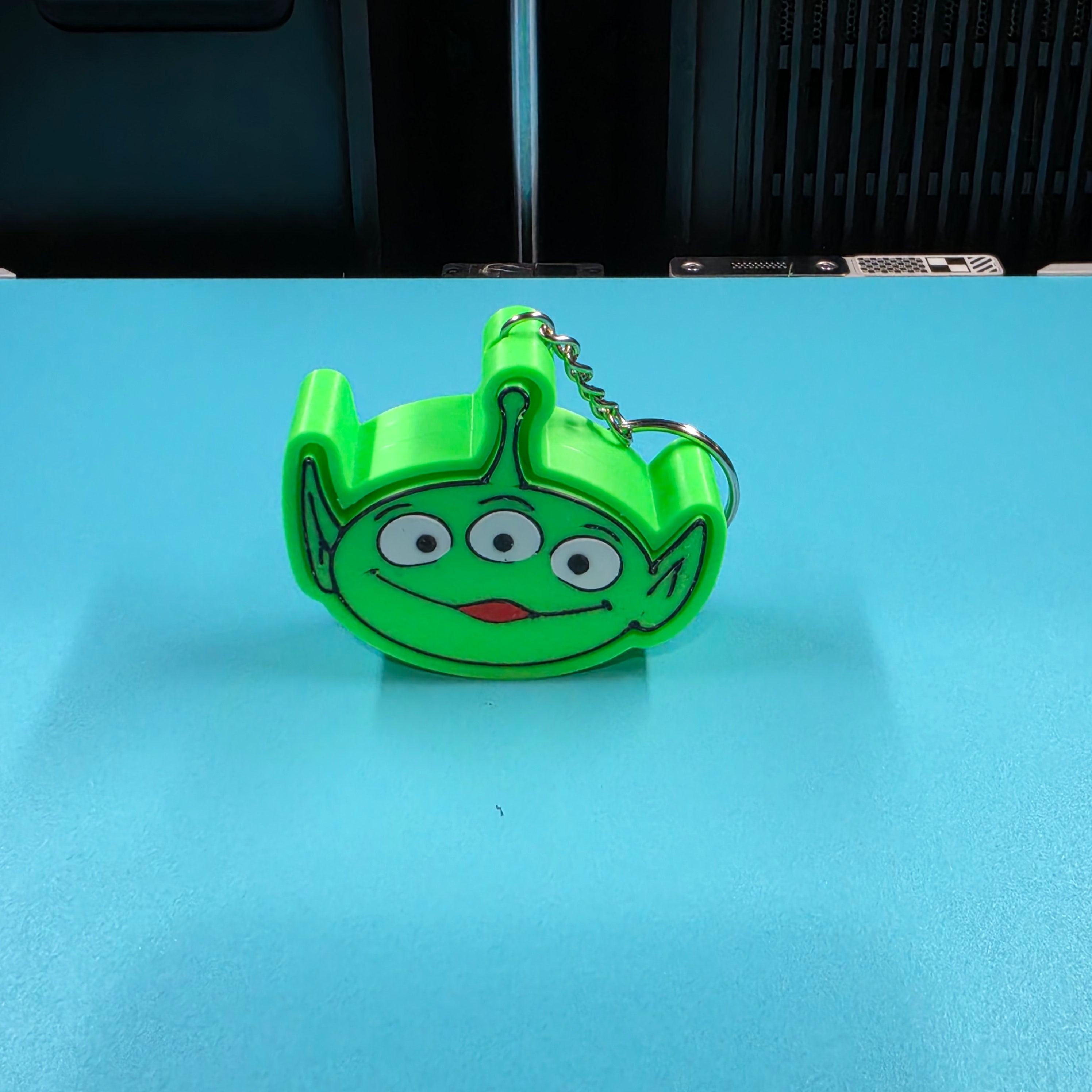 Toy Story alien fidget clicker keychain